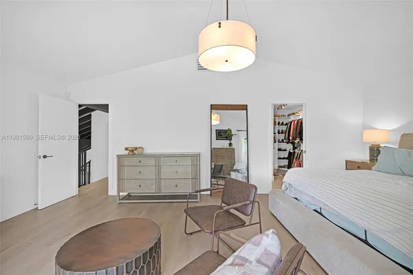 a bathroom with a sink a mirror and a toilet