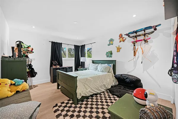 a view of storage and utility room with washer and dryer