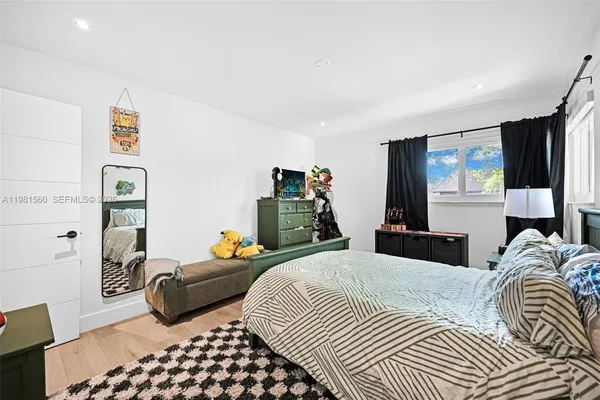 a view of house with outdoor space and swimming pool