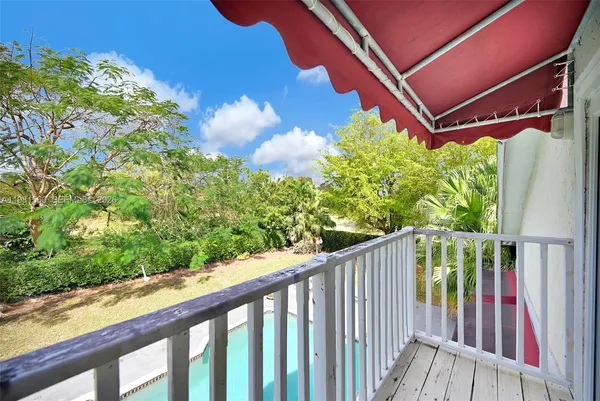 a view of a house with swimming pool