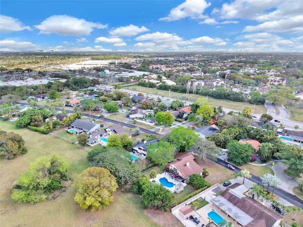 an aerial view of residential house with outdoor space