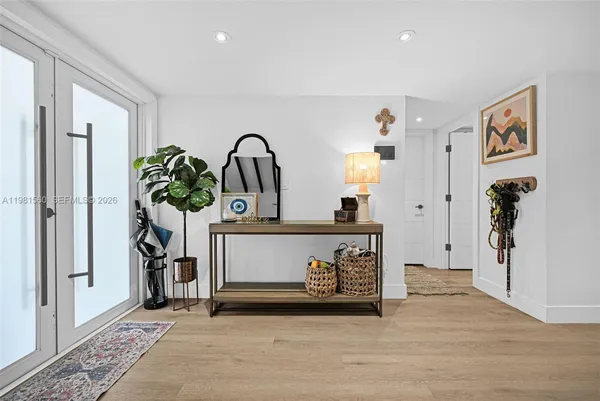 a view of entryway livingroom and hall