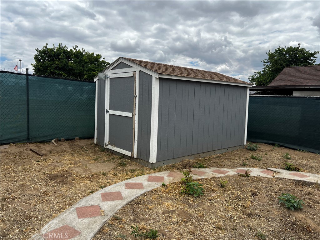 910 South Rancho Avenue Colton, CA 92324 - Photo 23 of 27 Side shed
