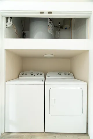 a bathroom with a sink and shower