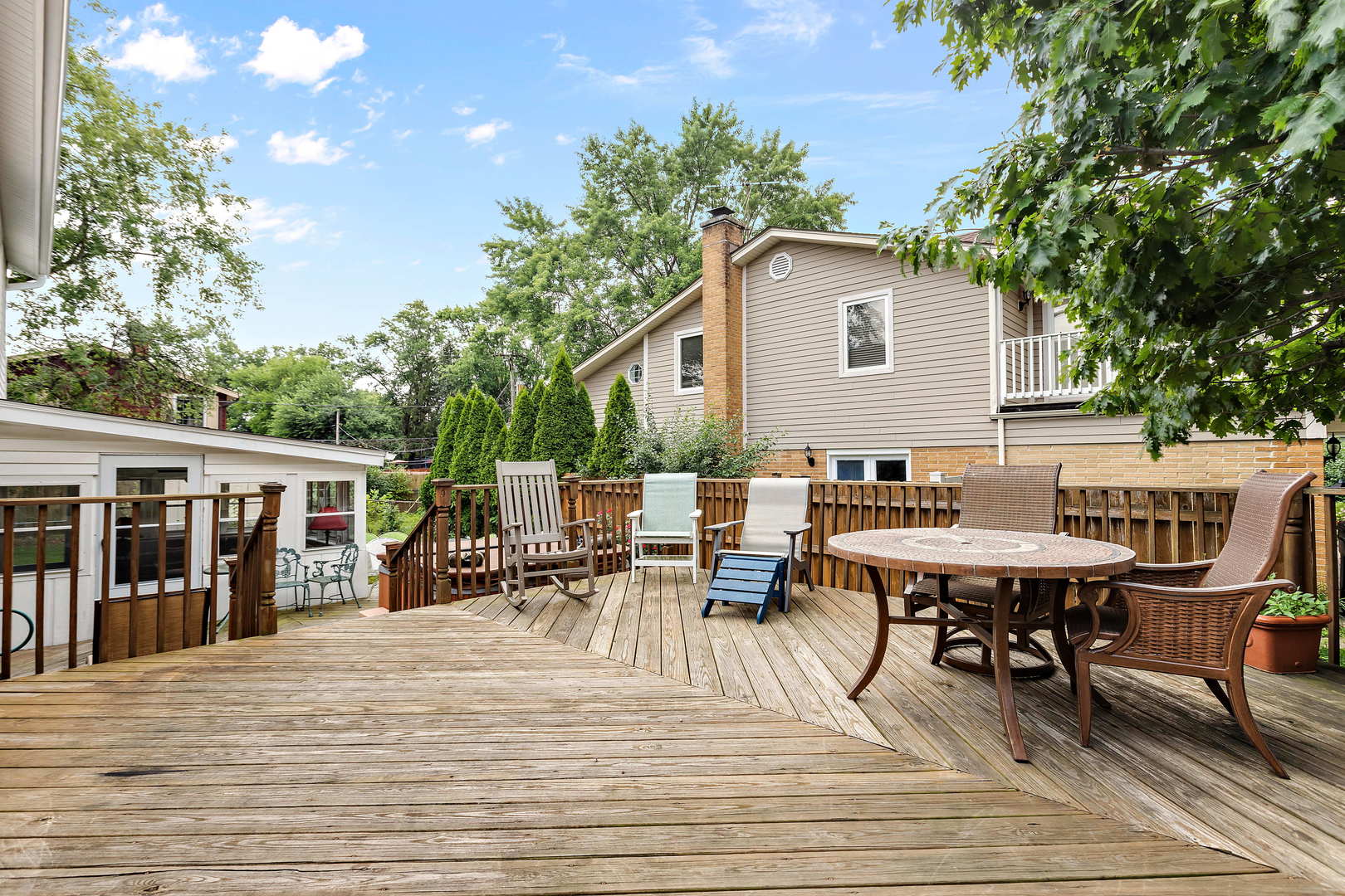 1524 Pfingsten Road Glenview, IL 60025 - Photo 22 of 26 a view of a dinning table and chairs in the patio