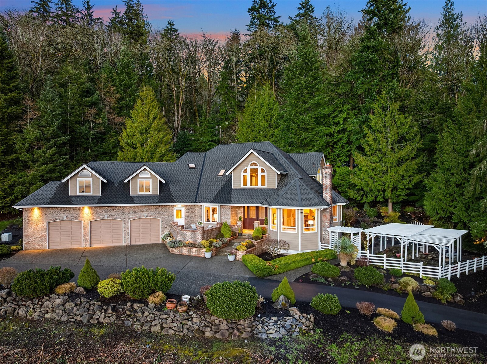 17620 Southeast 106th Street Renton, WA 98059 - Photo 2 of 40 a front view of a house with a yard