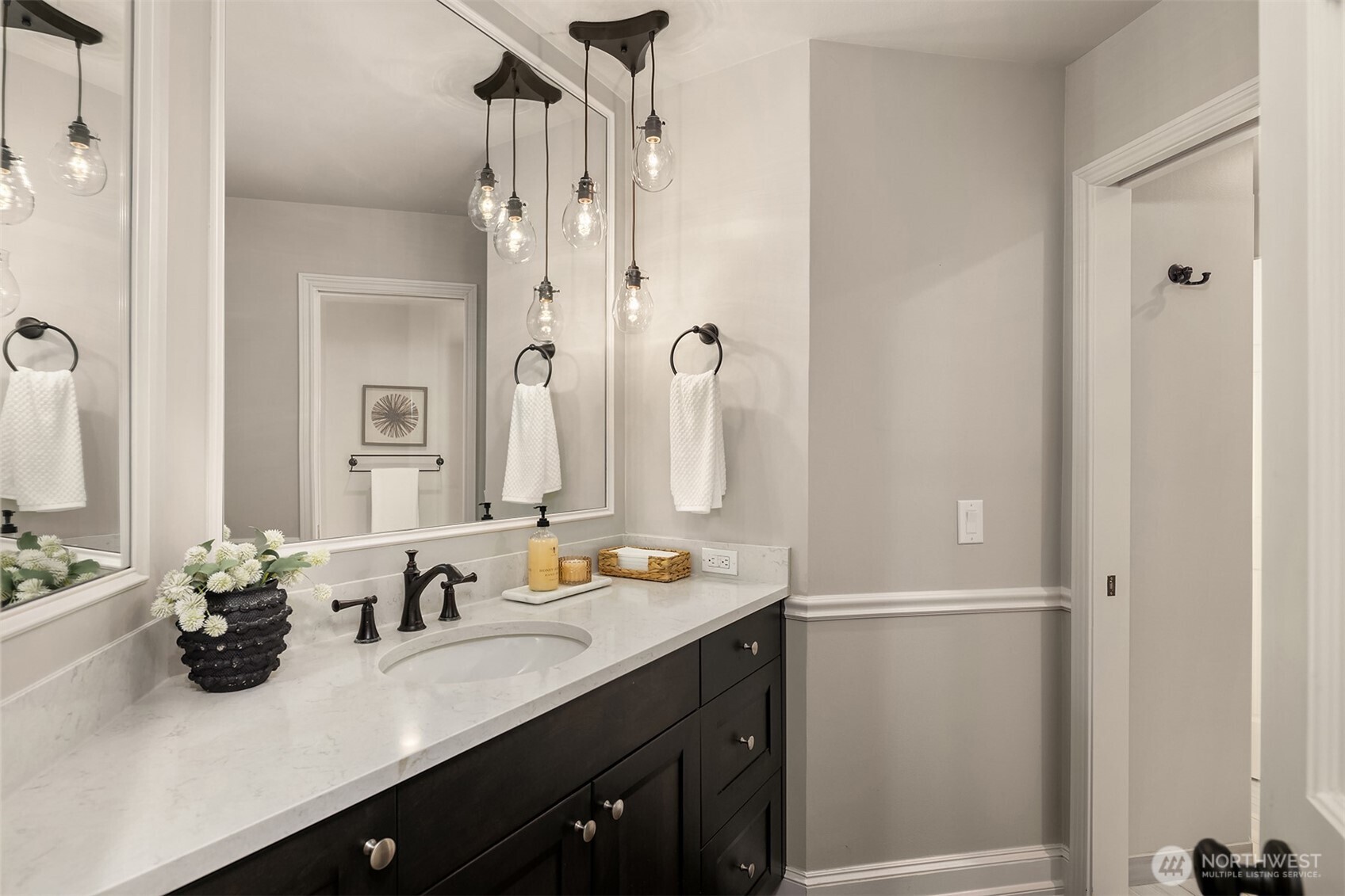 17620 Southeast 106th Street Renton, WA 98059 - Photo 21 of 40 a bathroom with a sink vanity granite and a mirror