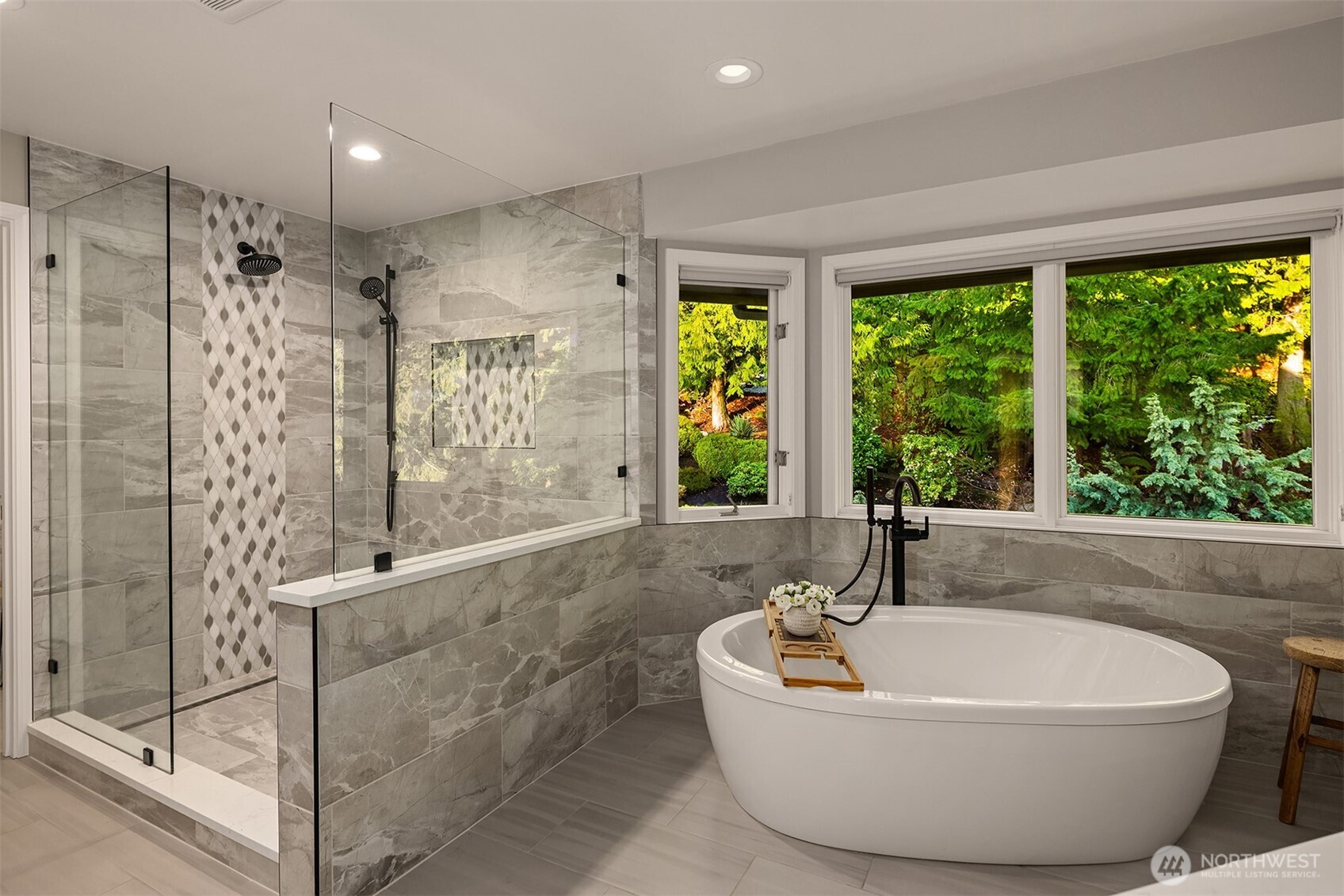 17620 Southeast 106th Street Renton, WA 98059 - Photo 24 of 40 a white bath tub sitting in a bathroom next to a window
