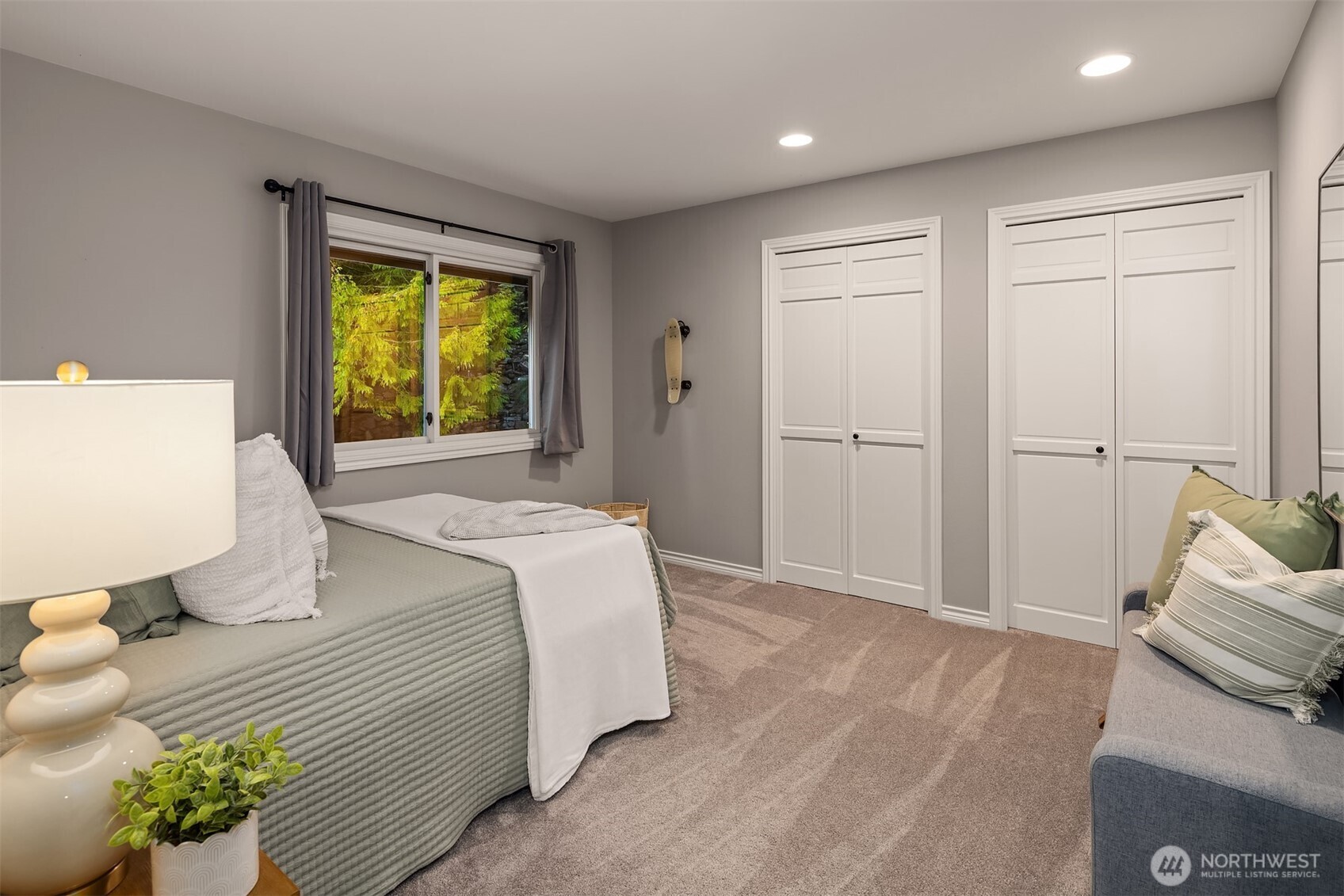 17620 Southeast 106th Street Renton, WA 98059 - Photo 26 of 40 a bedroom with a bed and a window