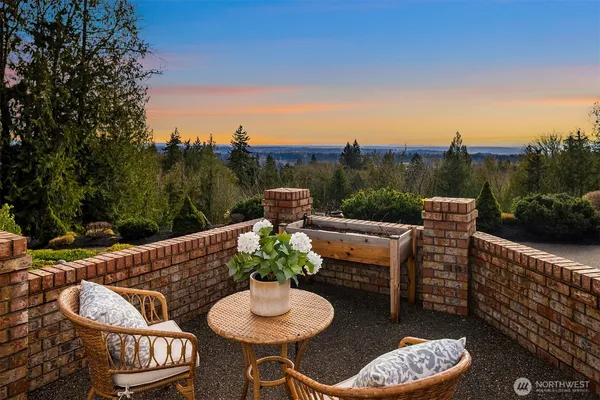 a view of a patio with furniture