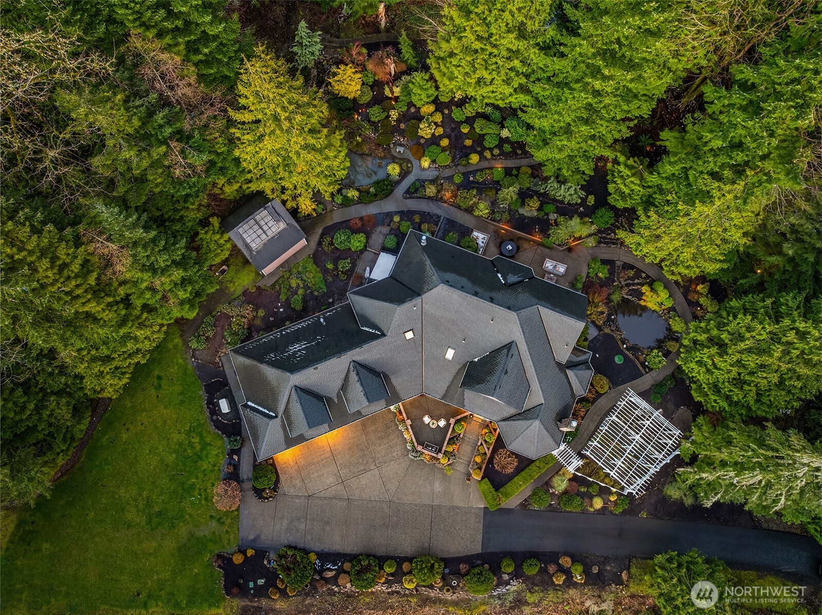 17620 Southeast 106th Street Renton, WA 98059 - Photo 36 of 40 an aerial view of a house with a yard and large trees