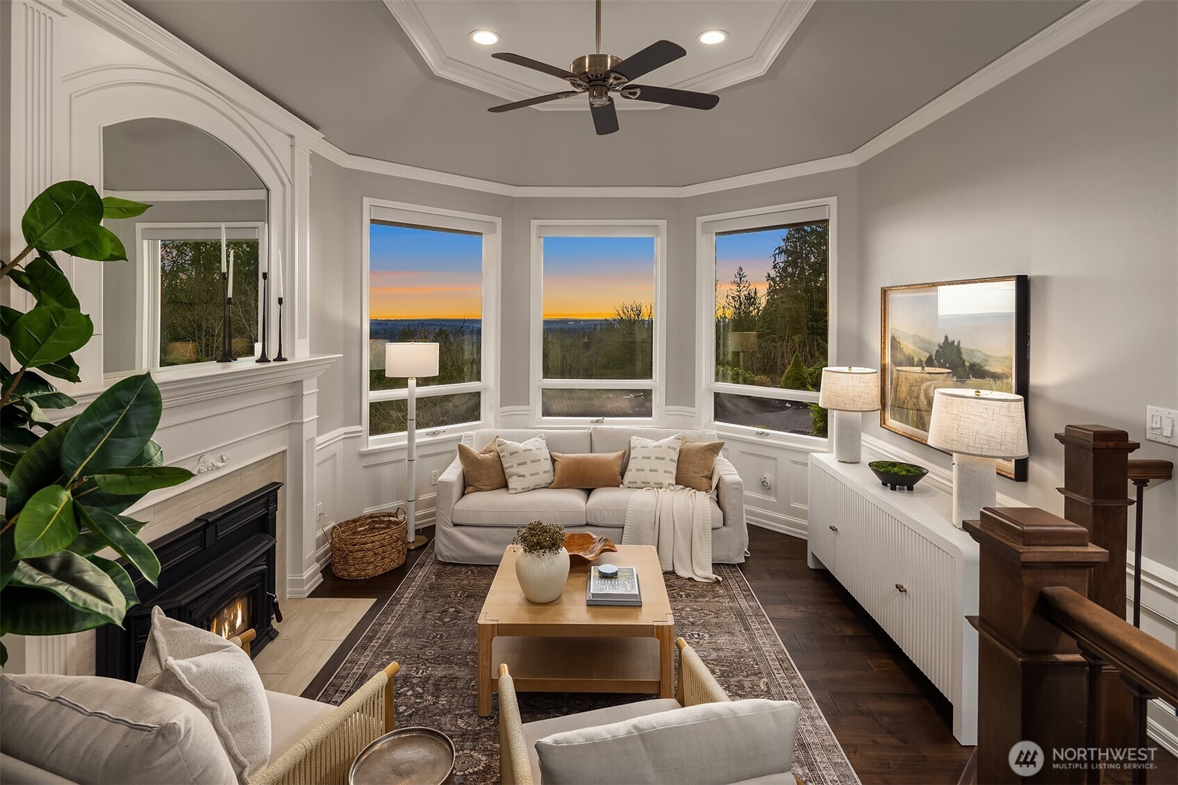 17620 Southeast 106th Street Renton, WA 98059 - Photo 9 of 40 a living room with furniture ceiling fan and a large window