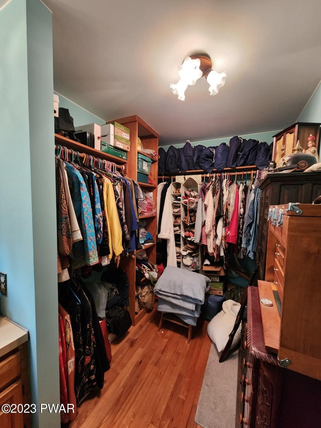114 Rim Rock Road Milford, PA 18337 - Photo 17 of 25 a view of walk in closet with clothes and shoes