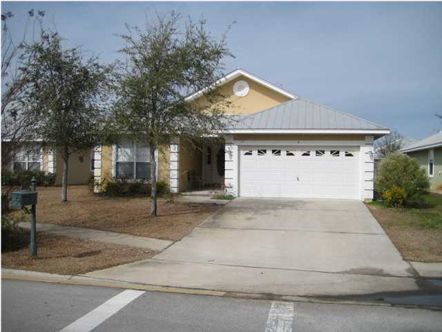 6 South Harborview Road Santa Rosa Beach, FL 32459 - Photo 1 of 2 front view of a house with a yard