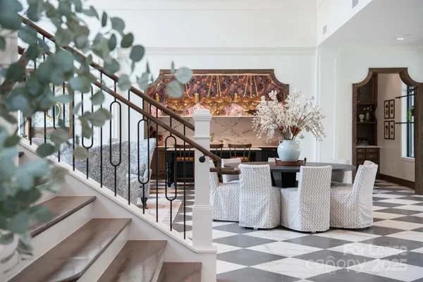 a view of a living room and entryway