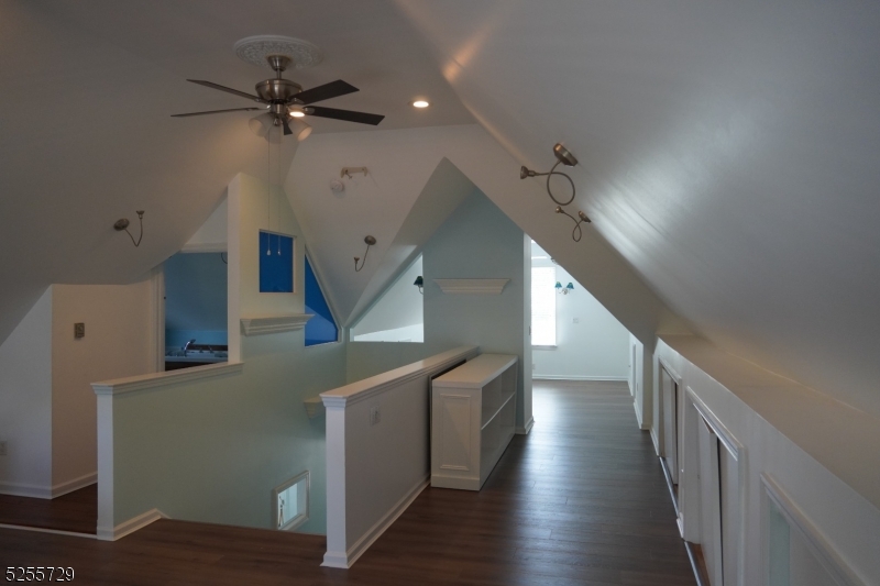 96 High Street Newton, NJ 07860 - Photo 12 of 26 a view of entryway and hall with wooden floor