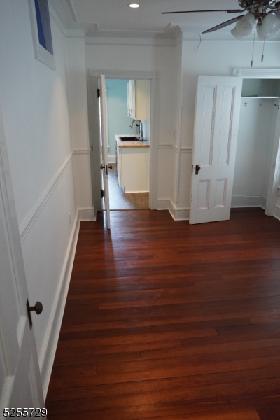 96 High Street Newton, NJ 07860 - Photo 17 of 26 a view of a kitchen with wooden floor and electronic appliances