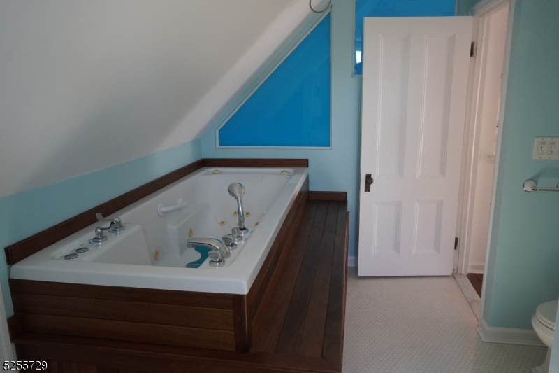 96 High Street Newton, NJ 07860 - Photo 20 of 26 a bathroom with a bathtub and shower