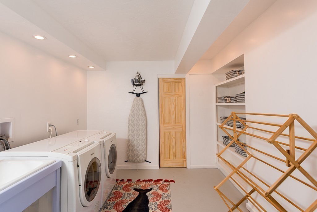 31 High Street Hingham, MA 02043 - Photo 27 of 29 a view of storage and utility room with washer and dryer