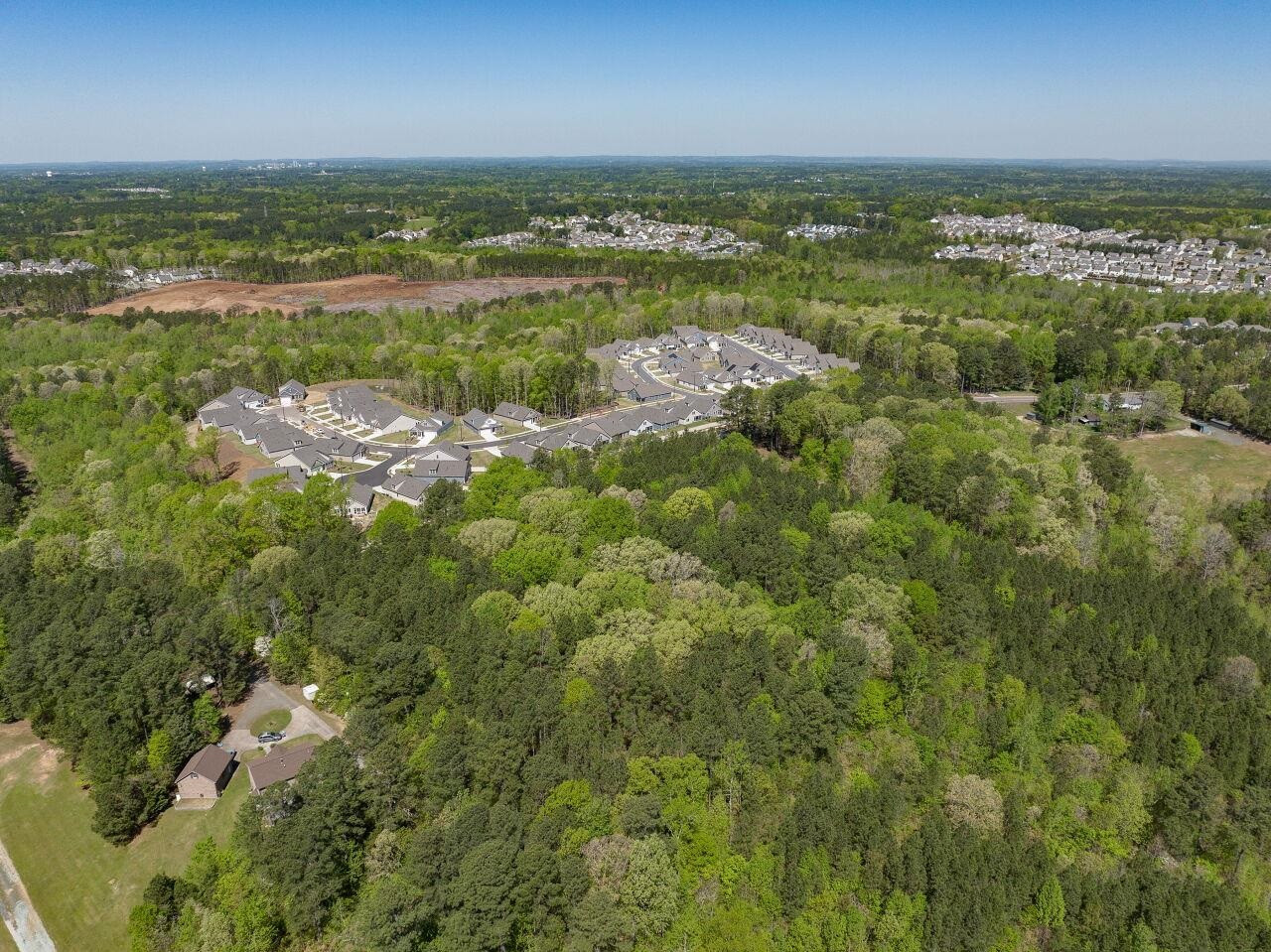 1301 Doc Nichols Road Durham, NC 27703 - Photo 6 of 9 a view of a city with an ocean