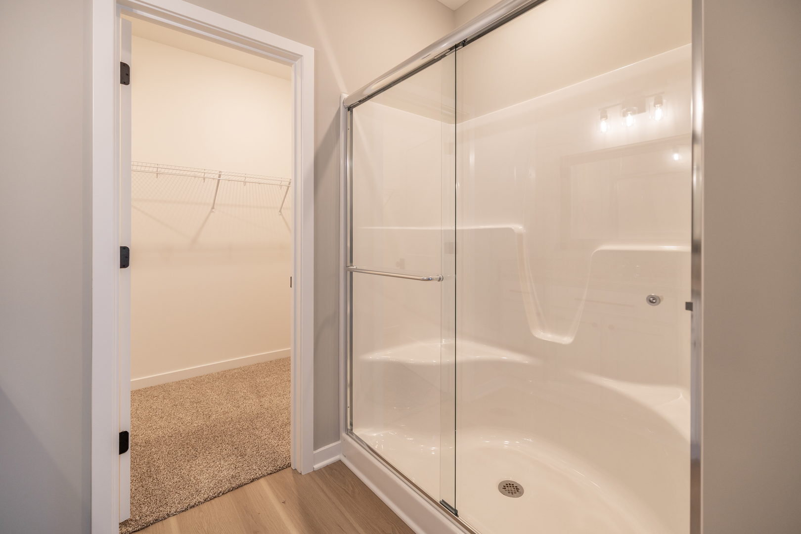 12 Redbud Row Ottawa, IL 61350 - Photo 19 of 39 a bathroom with a glass shower door