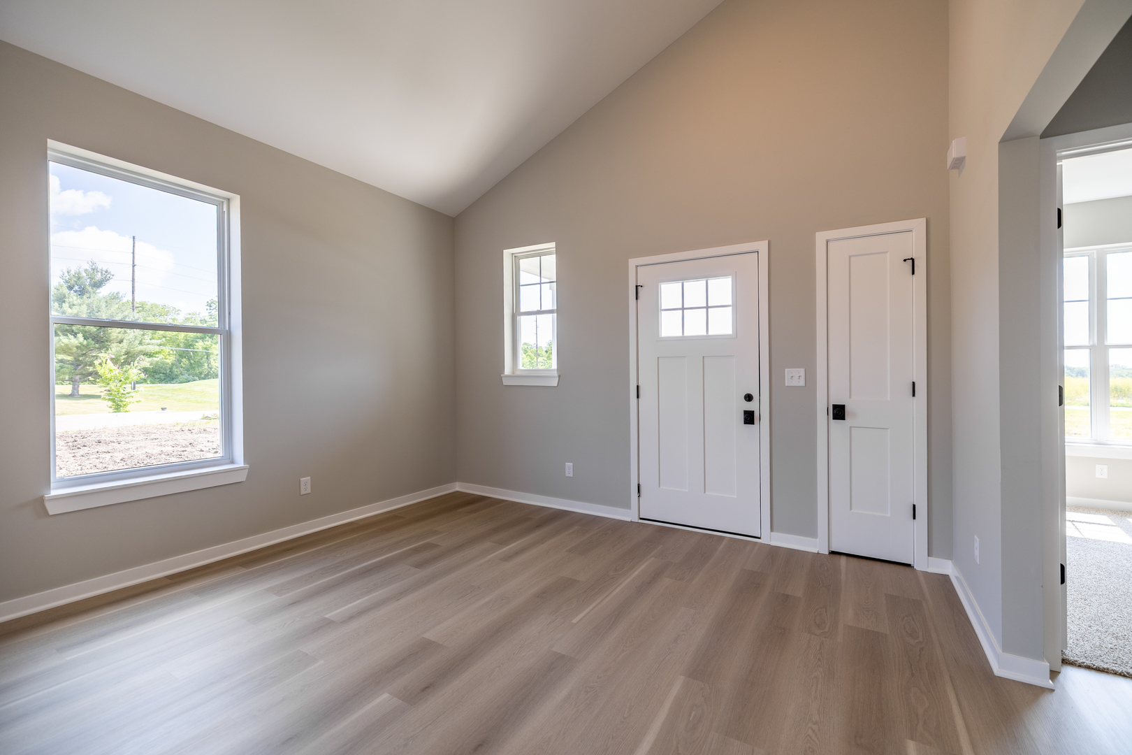12 Redbud Row Ottawa, IL 61350 - Photo 26 of 39 a view of an empty room with wooden floor and a window