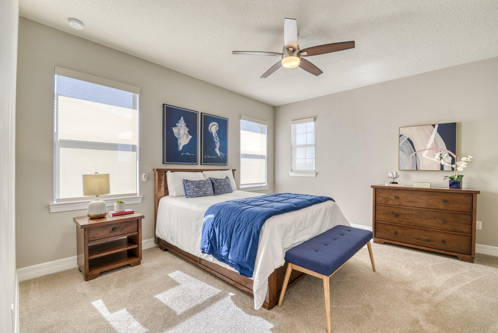 117 Croft Inlet Point Jupiter, FL 33478 - Photo 41 of 53 a bedroom with a bed and a dresser