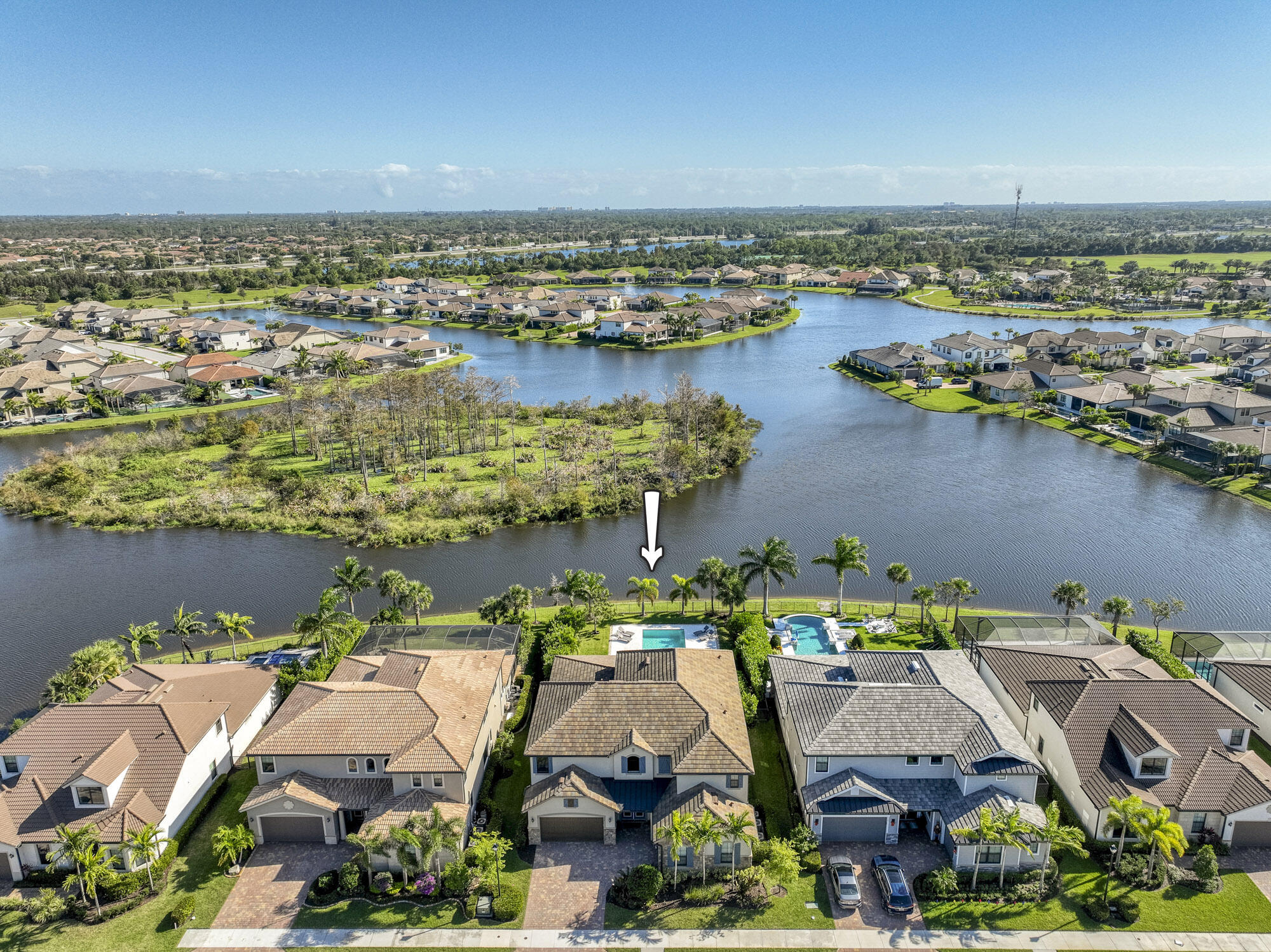 117 Croft Inlet Point Jupiter, FL 33478 - Photo 44 of 53 an aerial view of residential houses with outdoor space and lake view