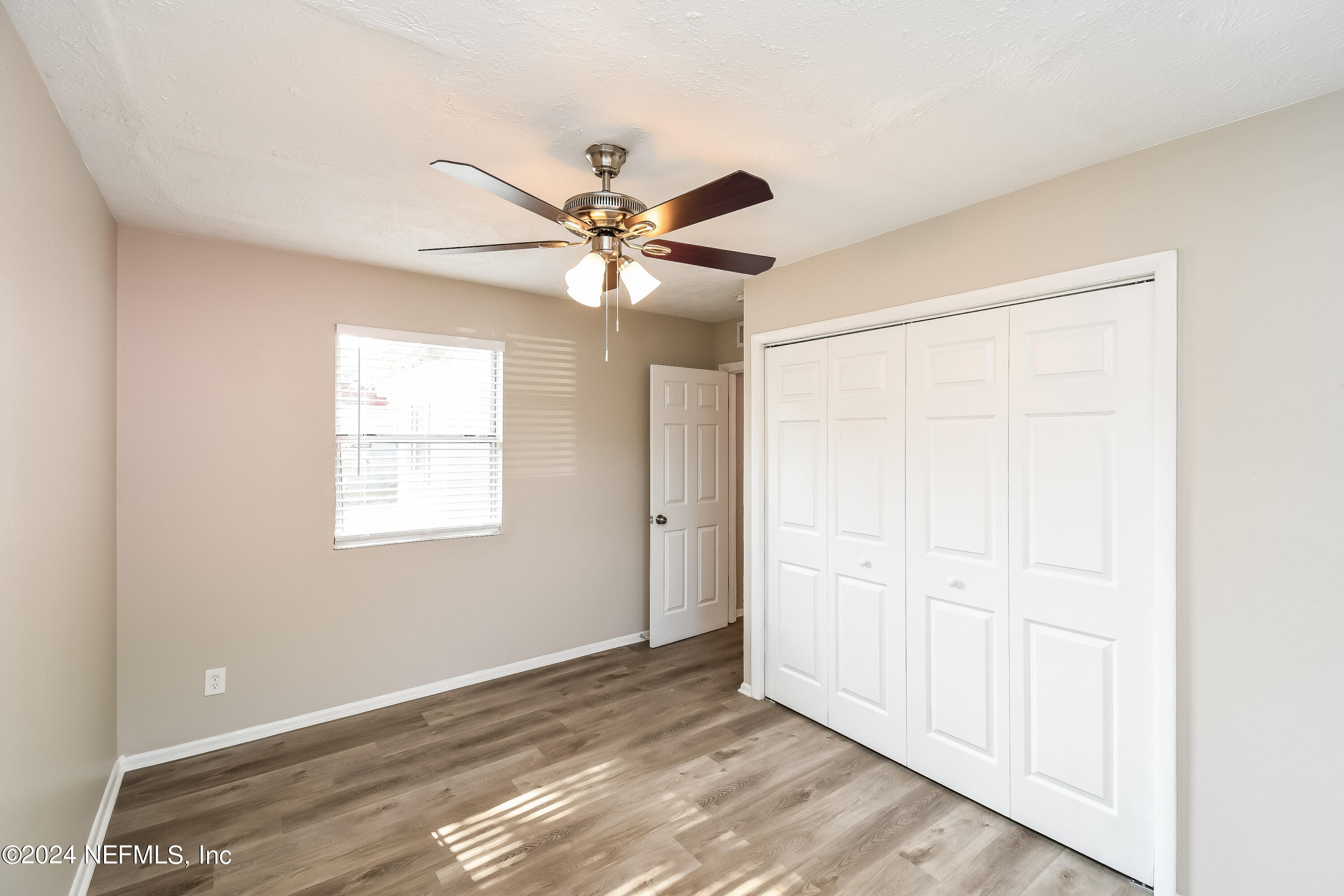 7217 Eudine Drive South Jacksonville, FL 32210 - Photo 11 of 16 a view of an empty room with a window