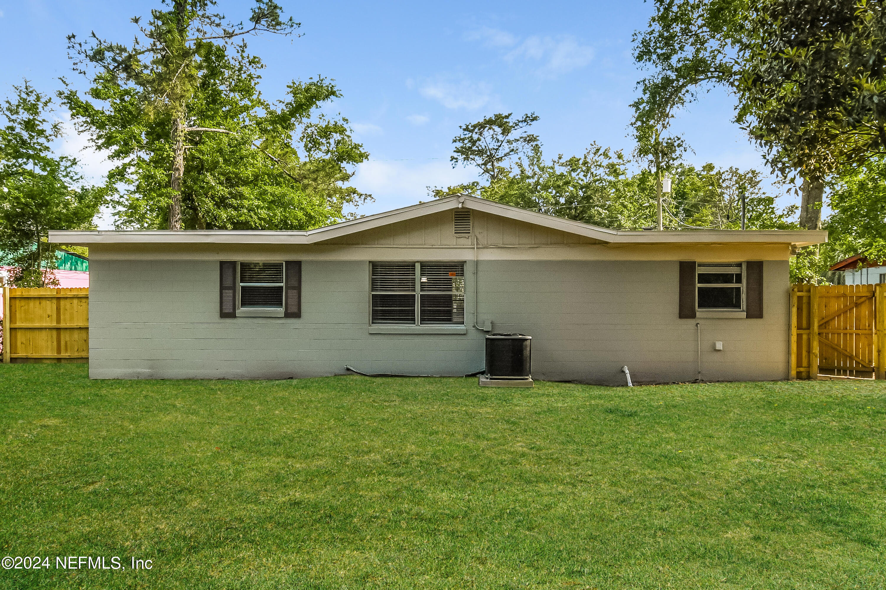 7217 Eudine Drive South Jacksonville, FL 32210 - Photo 15 of 16 a house that has a garden