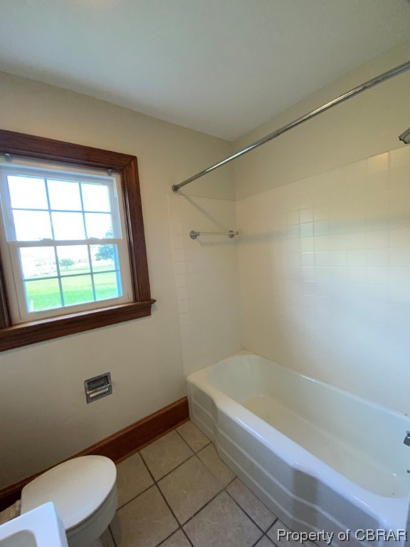 14 Light Street Heathsville, VA 22473 - Photo 15 of 18 Bathroom featuring tile flooring, toilet, and tub / shower combination
