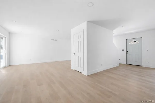an empty room with an entryway