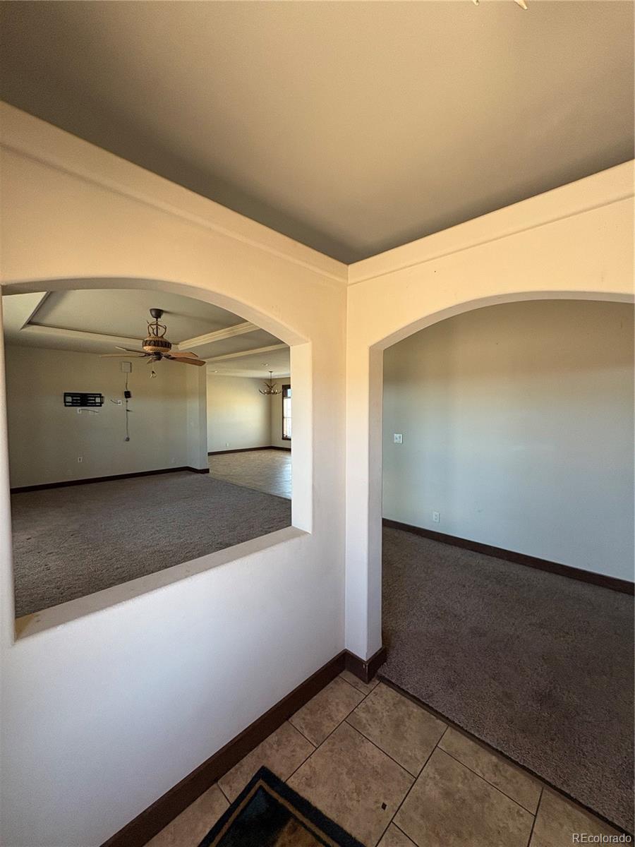 1925 Doe Valley Road Guffey, CO 80820 - Photo 3 of 32 a view of a room with a wooden floor