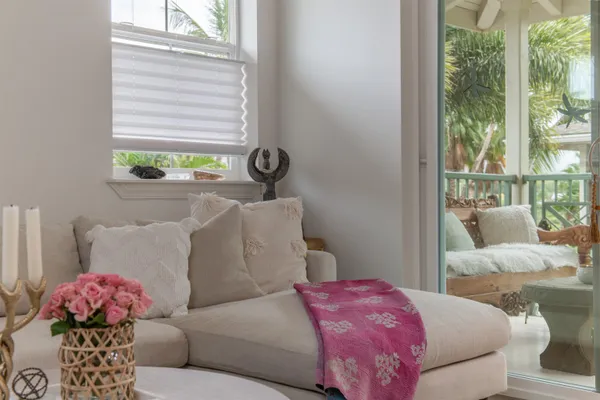 a living room with furniture and a window