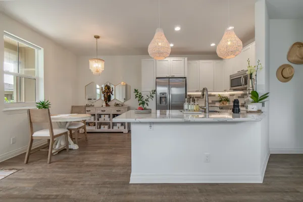 a kitchen with counter space cabinets and appliances