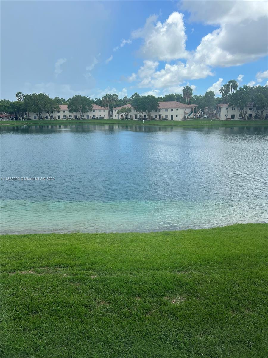 2921 Southeast 12th Road, Unit 20656 Homestead, FL 33035 - Photo 9 of 9 a view of a lake with a city