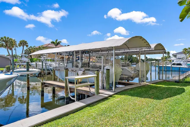 a view of a chairs and table in patio