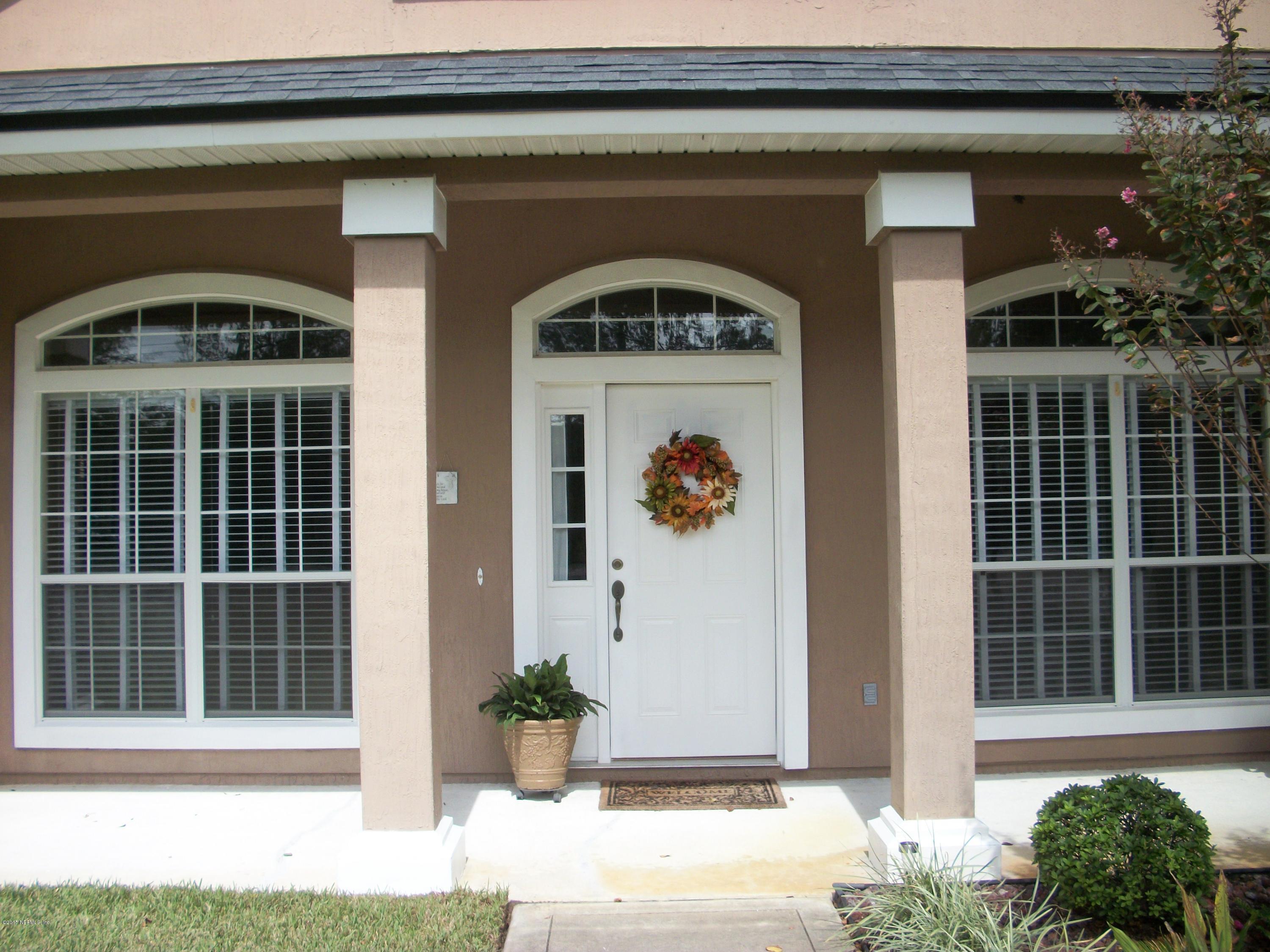 96057 Maranatha Road Yulee, FL 32097 - Photo 2 of 25 a view of entrance front of the house