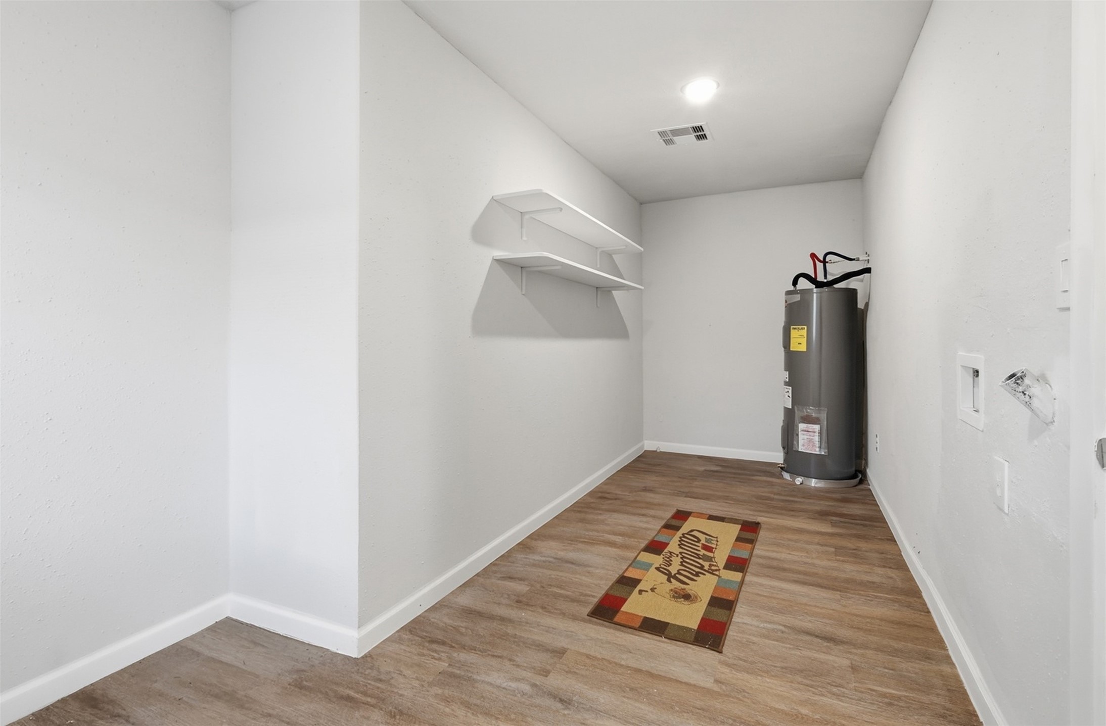 4767 Beechaven Street Houston, TX 77053 - Photo 7 of 26 an empty room with wooden floor and window