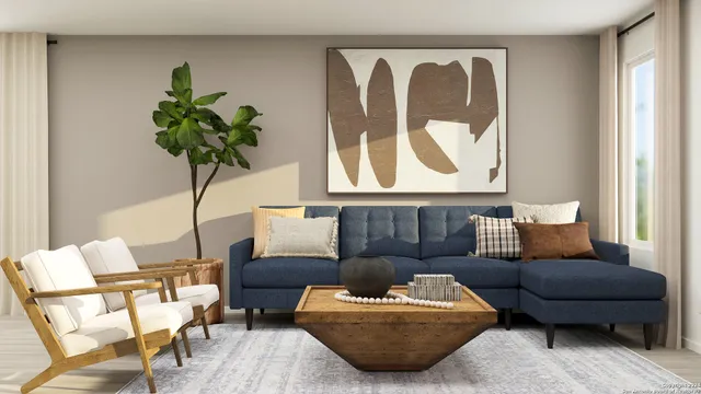 a living room with furniture and a potted plant