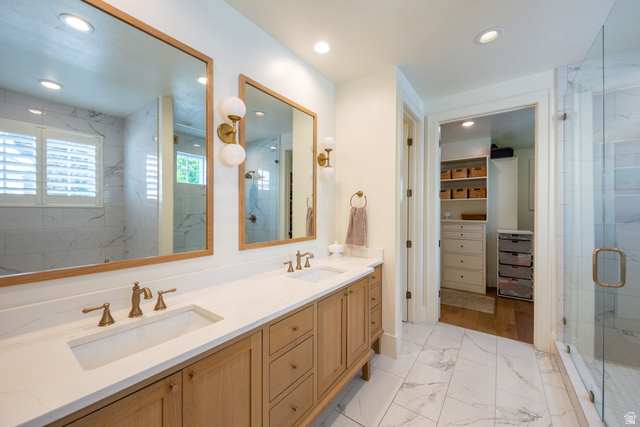 630 East Center Street Alpine, UT 84004 - Photo 43 of 115 Bathroom featuring a dual vanity with light wood cabinetry, white countertops, and bronze-finish fixtures