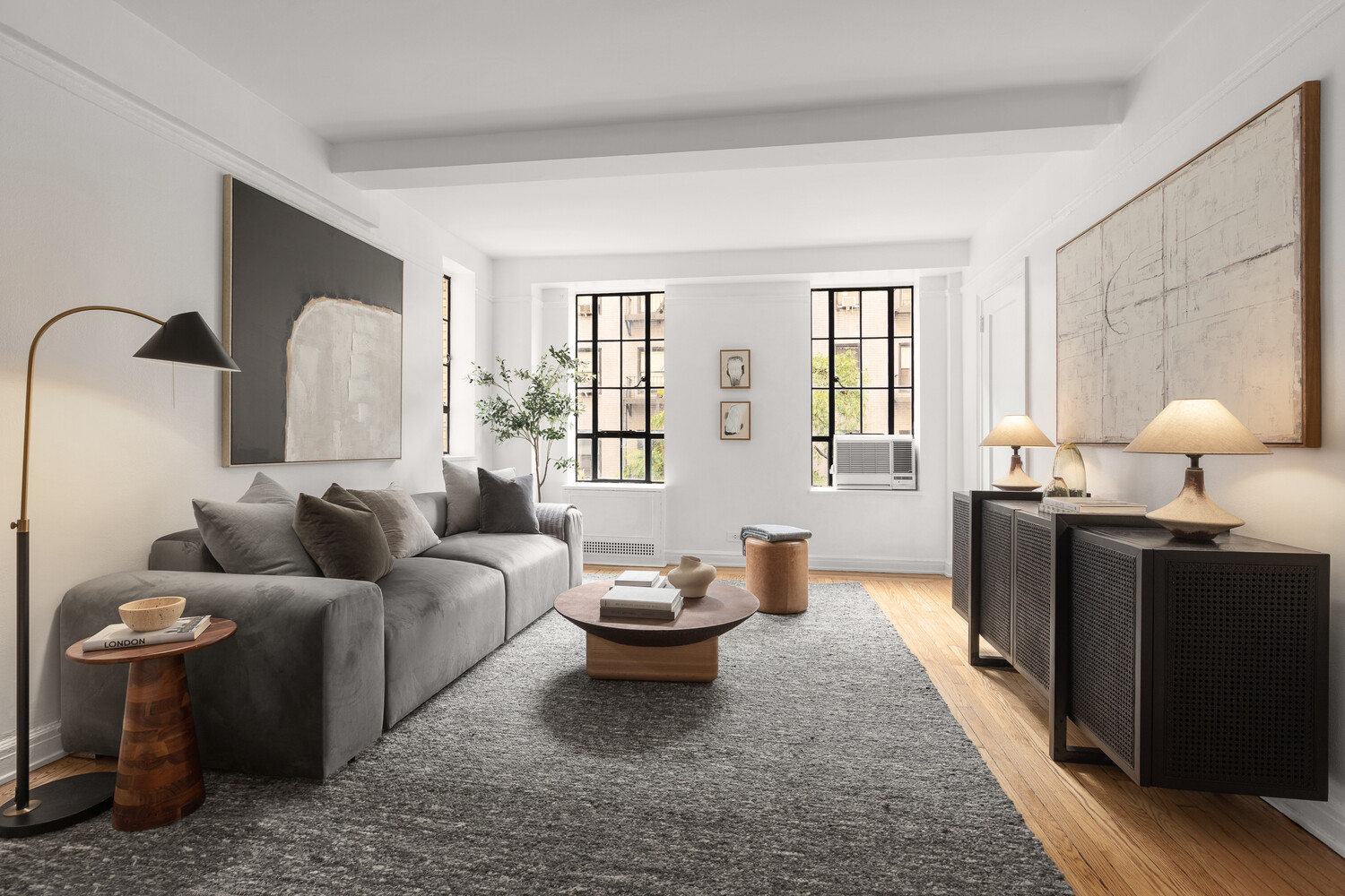 a living room with furniture and window