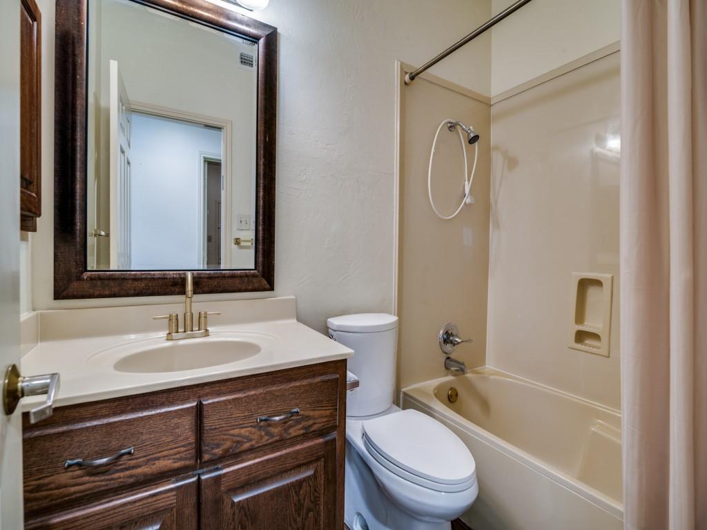 9959 Waterfront Trail Rowlett, TX 75087 - Photo 13 of 26 a bathroom with a sink a toilet and shower