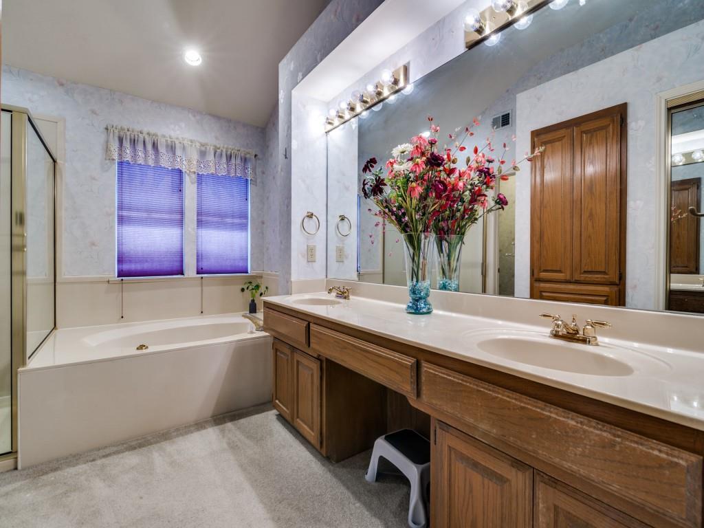 9959 Waterfront Trail Rowlett, TX 75087 - Photo 18 of 26 Full bath with a garden tub, double vanity, and wallpapered walls