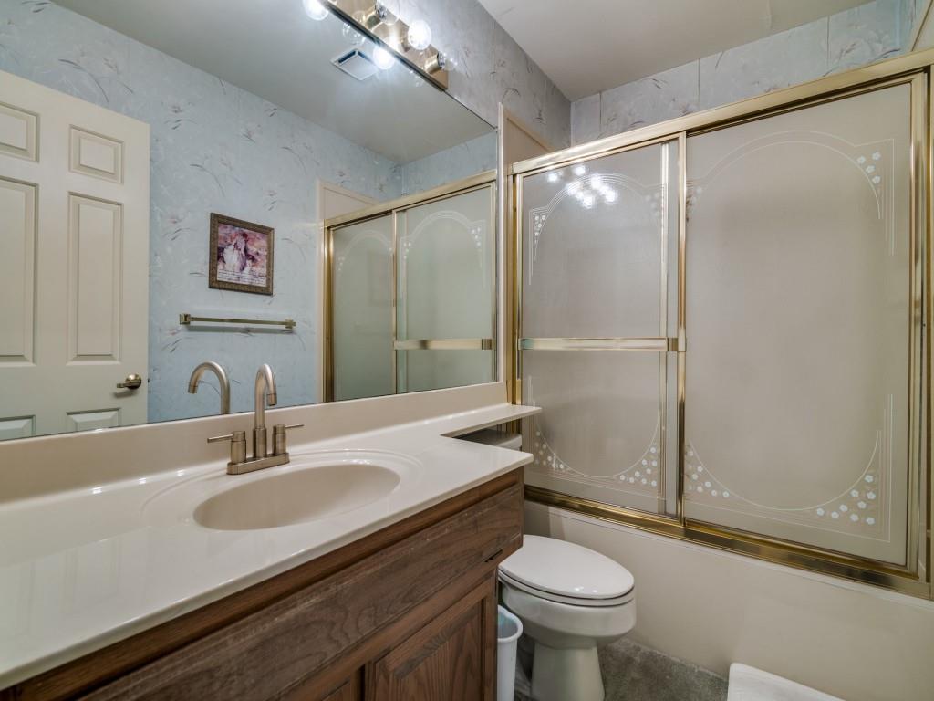 9959 Waterfront Trail Rowlett, TX 75087 - Photo 18 of 26 a bathroom with a sink toilet and shower