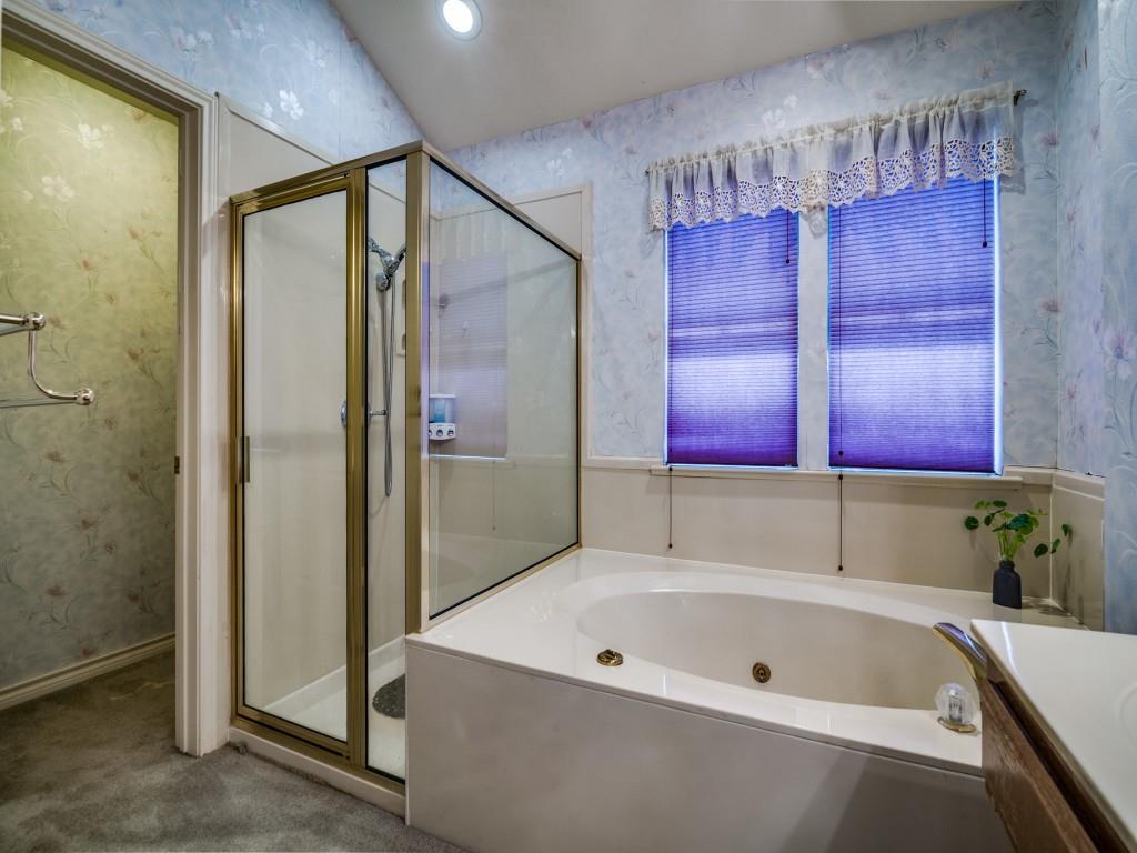 9959 Waterfront Trail Rowlett, TX 75087 - Photo 20 of 26 Bathroom featuring wallpapered walls, a stall shower, a tub with jets, and vanity