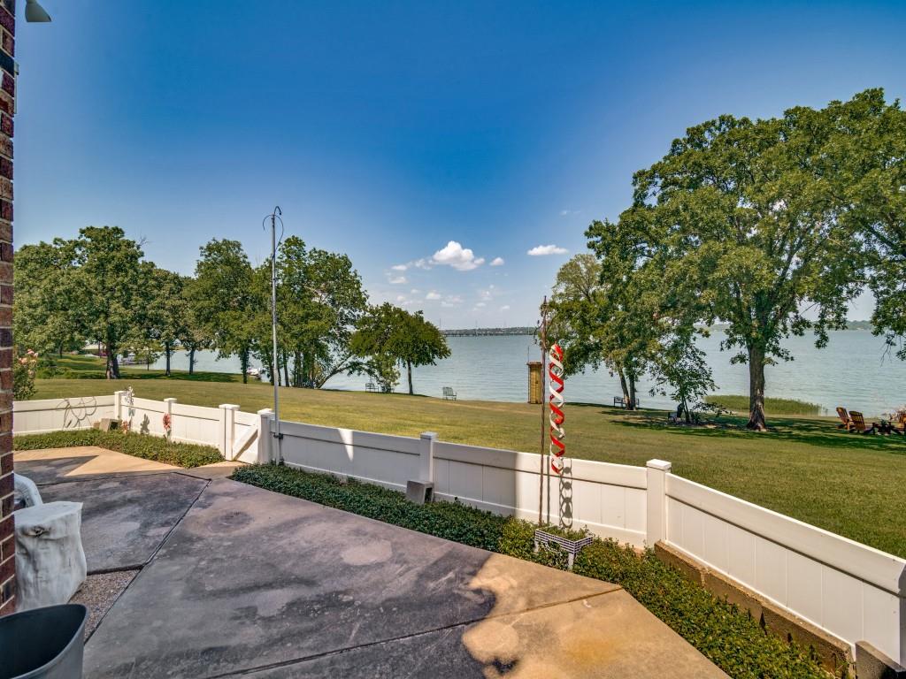 9959 Waterfront Trail Rowlett, TX 75087 - Photo 25 of 26 View of patio with a water view