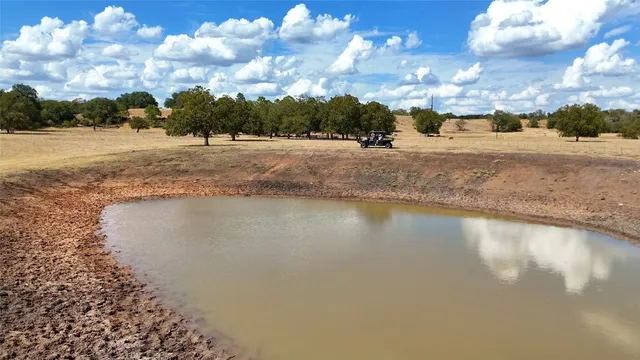 a view of a swimming pool and an outdoor space