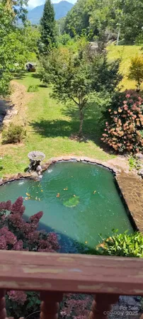 a view of a lake with a yard