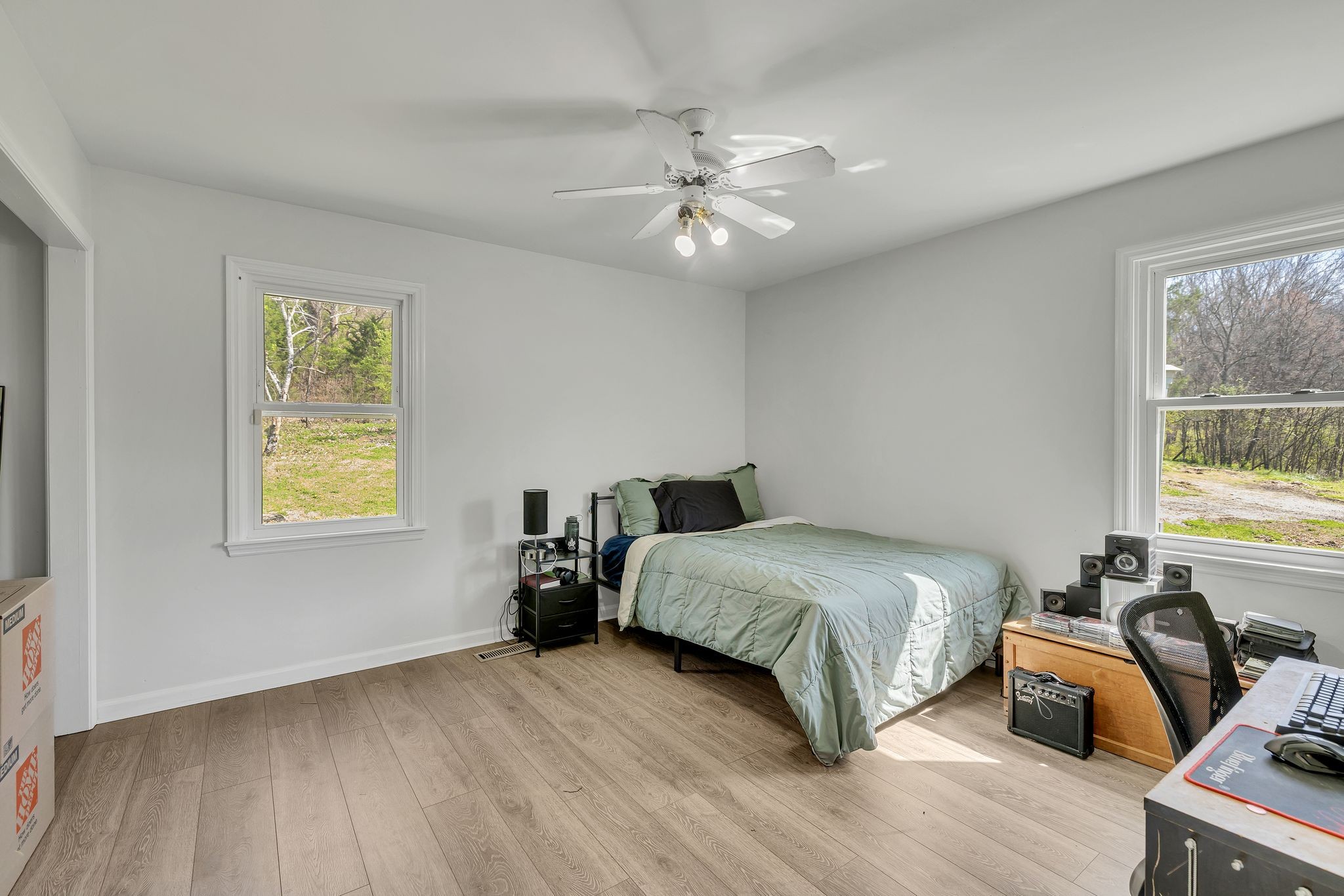 1830 Popes Chapel Road Thompson's Station, TN 37179 - Photo 20 of 53 a bedroom with a bed and wooden floor